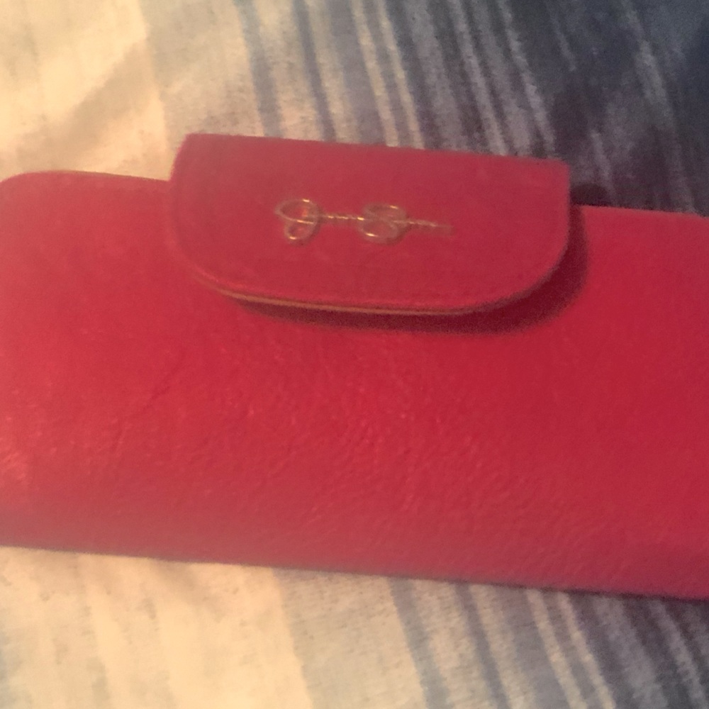 Jessica Simpson? wallet in like new condition besides a  small discoloration
